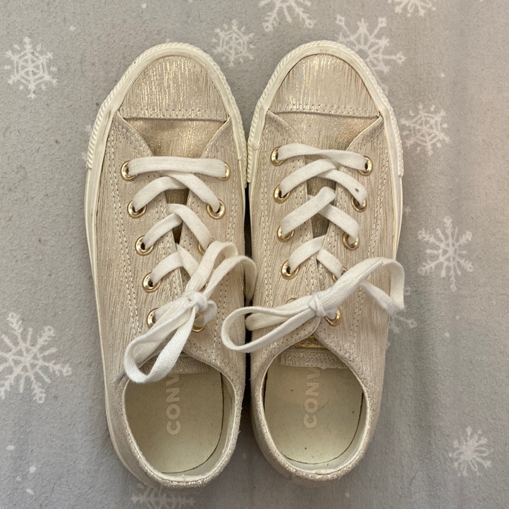 Tan and gold sparkly converse.